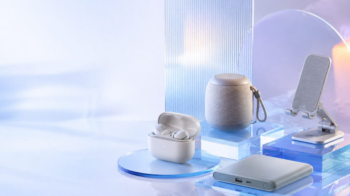 A curated mix of generic mobile and everyday gadgets in a luminous frosted-glass studio